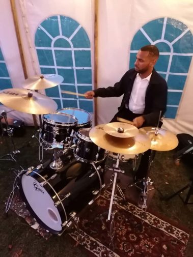 Drumming with the Das Brass band